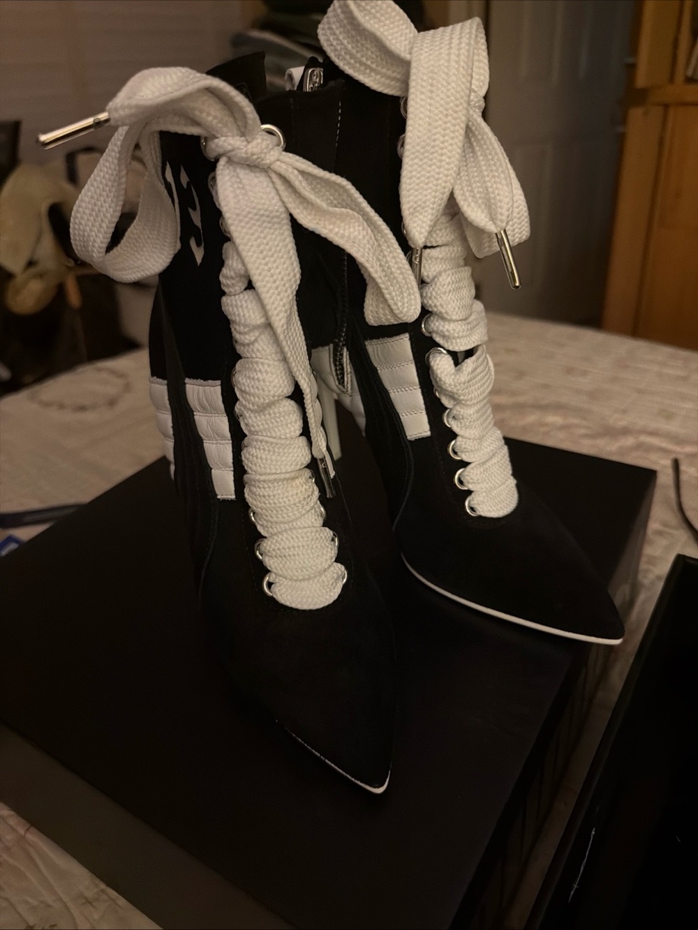 Pointed Black Ankle Booties with White Lace-Up Detail